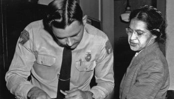 Rosa Parks is fingerprinted by police Lt. D.H. Lackey in Montgomery.