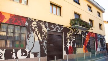 Europe. Italy. Lombardy. Milan. Ortica district. Street art with murals from the Or. Me. Ortica Memoria project. Wall of the workers' movement of the 1900s