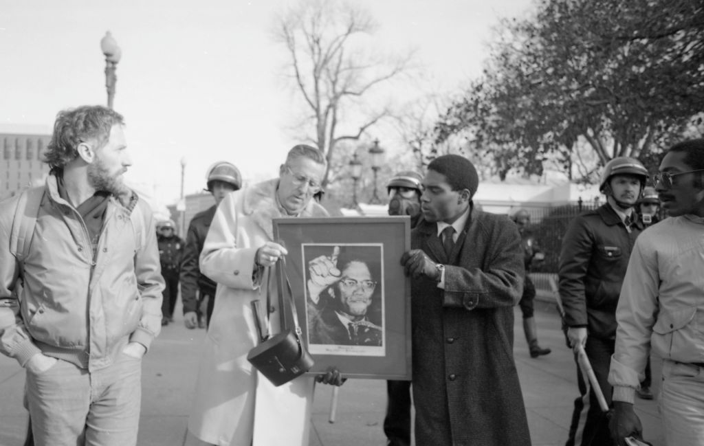 Anti-KKK Demonstrators Carry Malcolm X Photo