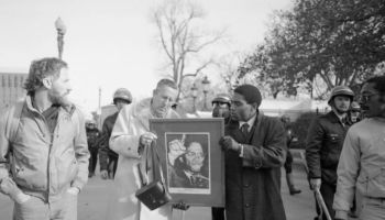 Anti-KKK Demonstrators Carry Malcolm X Photo